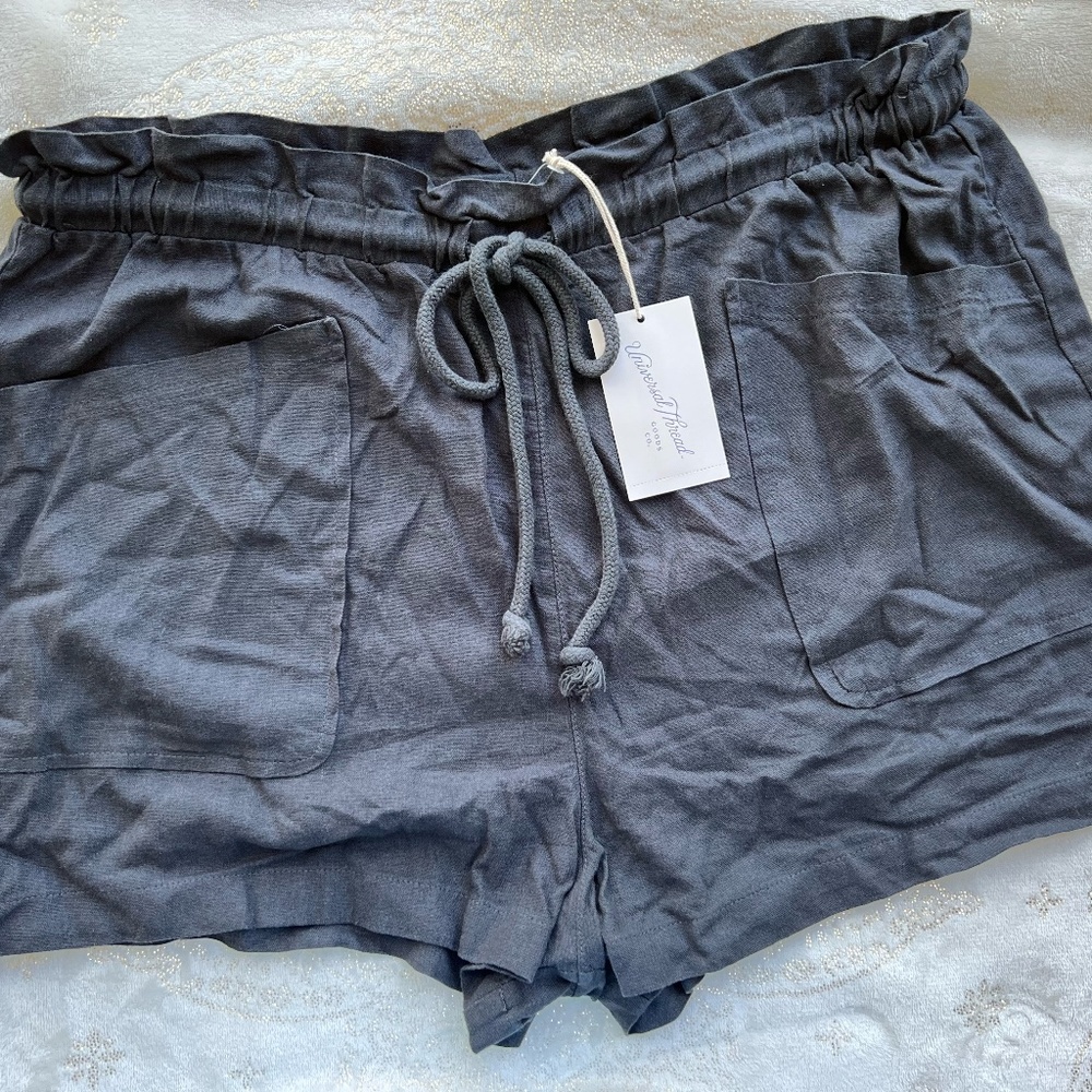 black fabric shorts with adjustable tie